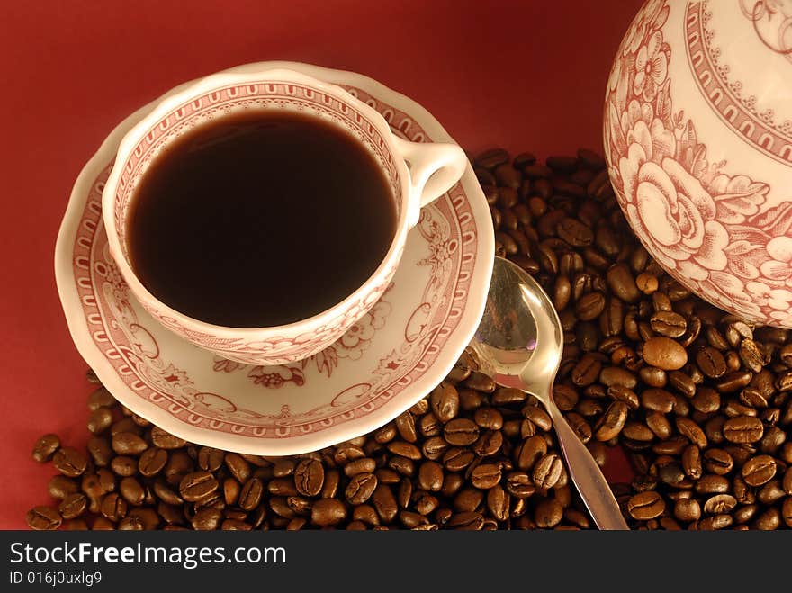 A studio shot series related to coffee - roasted beans with various cups and different backgrounds