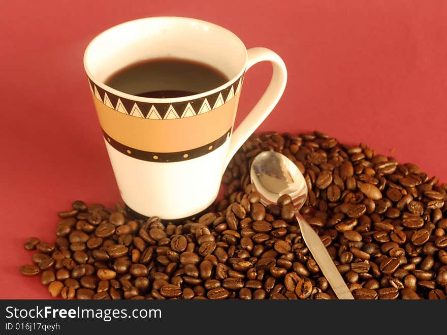 A studio shot series related to coffee - roasted beans with various cups and different backgrounds