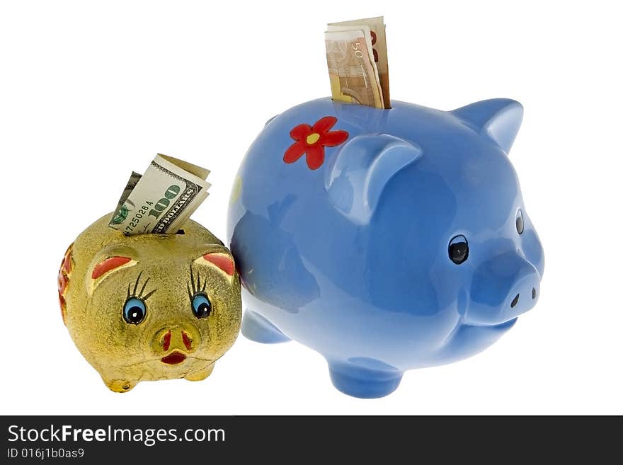 Piggy bank with dollar and euro against a white background