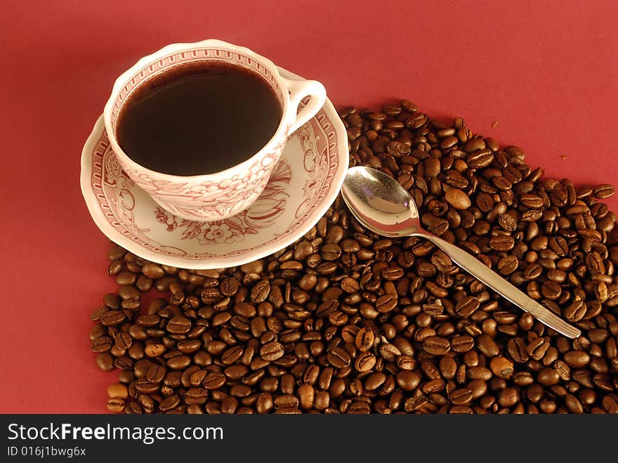 A studio shot series related to coffee - roasted beans with various cups and different backgrounds