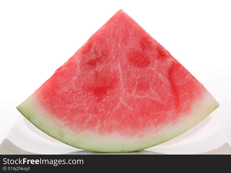 A fresh watermelon on a withe background.