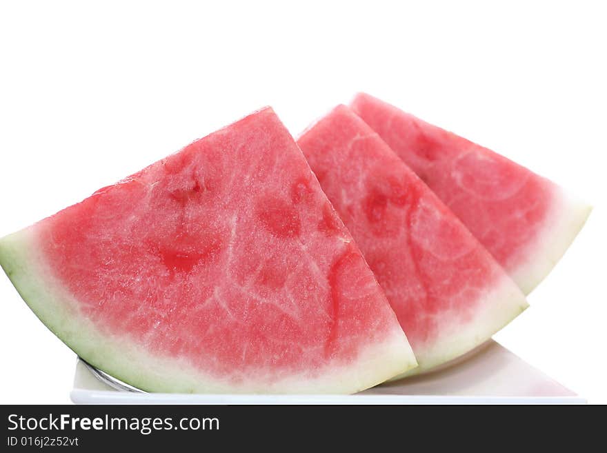 A fresh watermelon on a withe background.