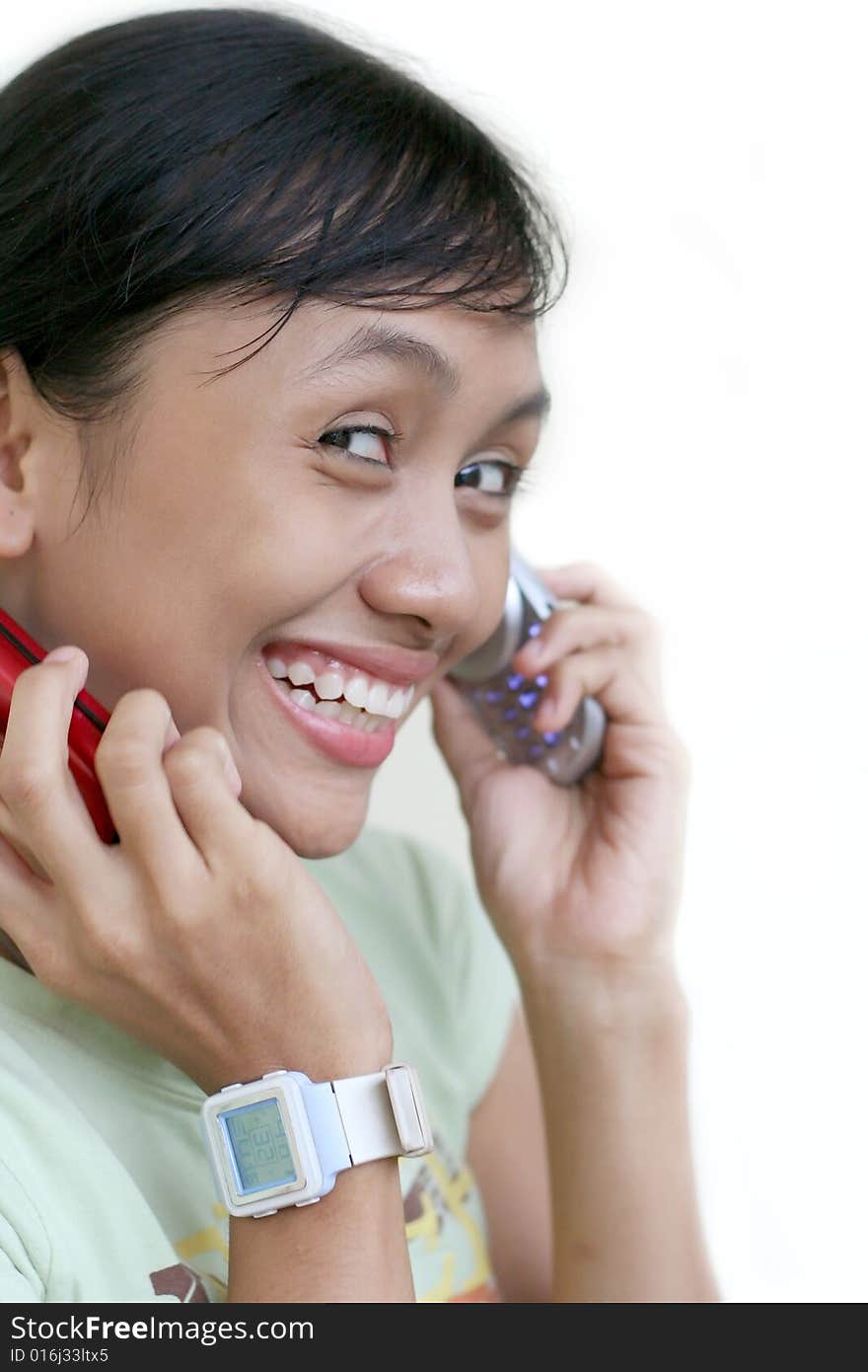 Young girl calling on mobile phone. Young girl calling on mobile phone