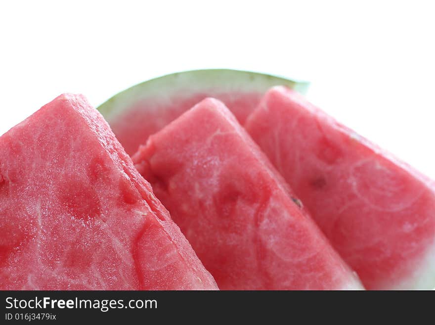 A fresh watermelon on a withe background.