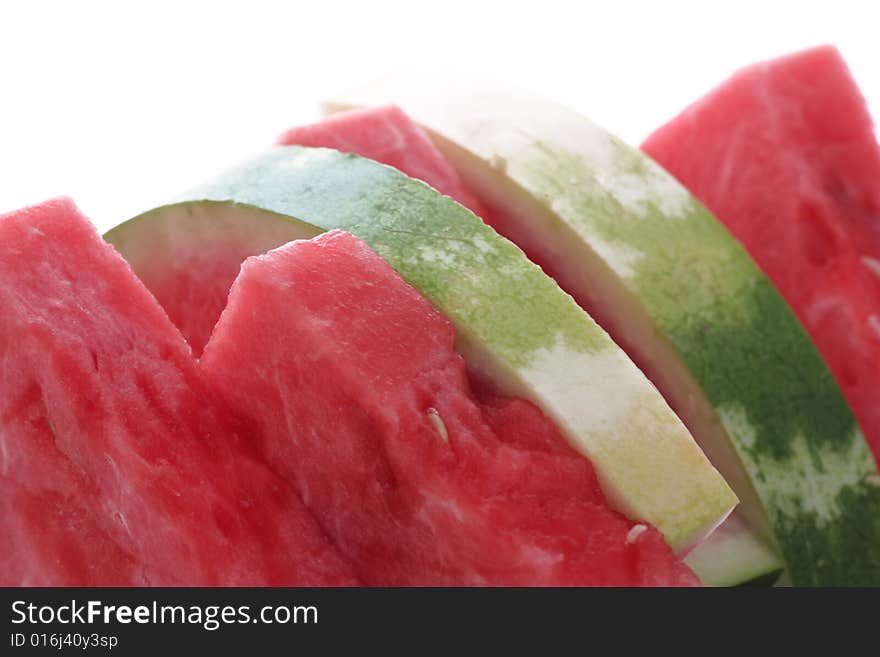 A fresh watermelon on a withe background.