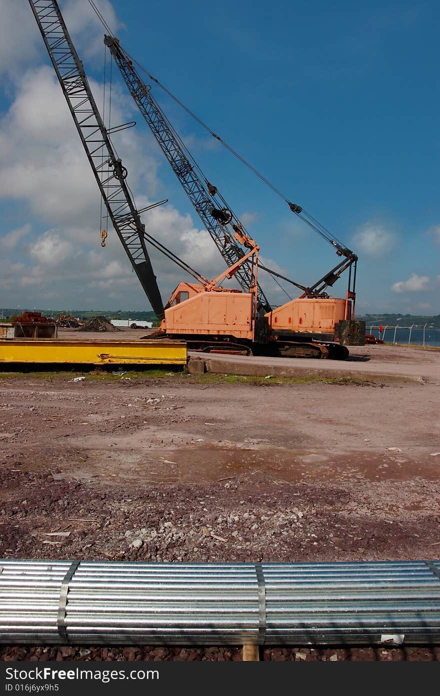 A pair of cranes on an irish quay. A pair of cranes on an irish quay