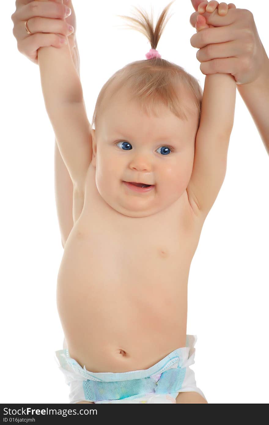 Beautiful baby in a rose plants. Shot in studio. Beautiful baby in a rose plants. Shot in studio.