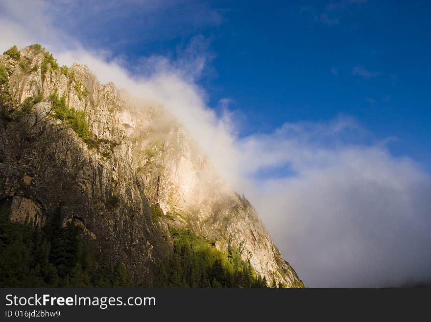 Hill and clouds