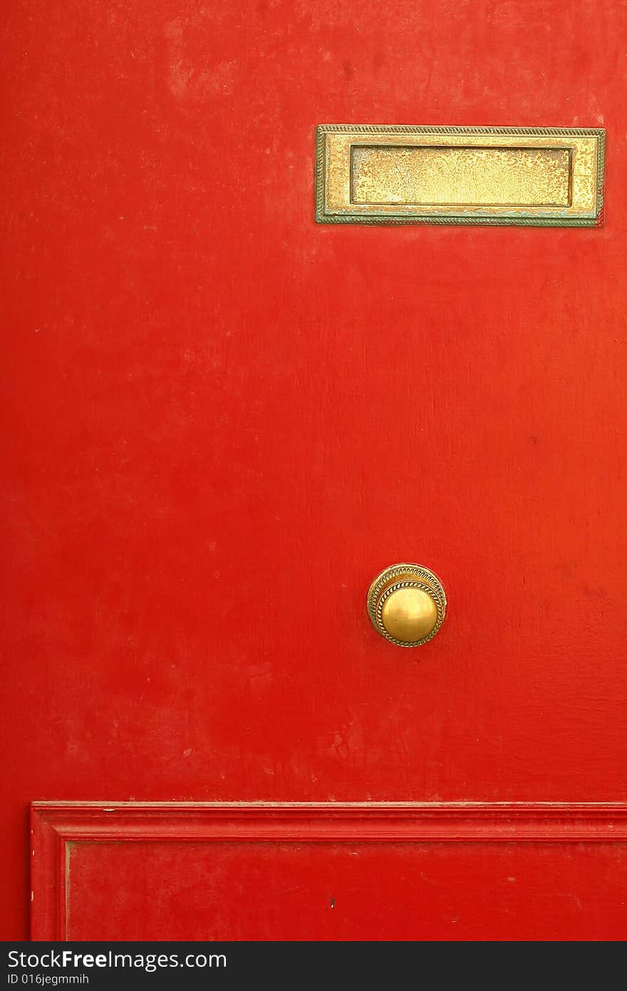 A portion of a red door