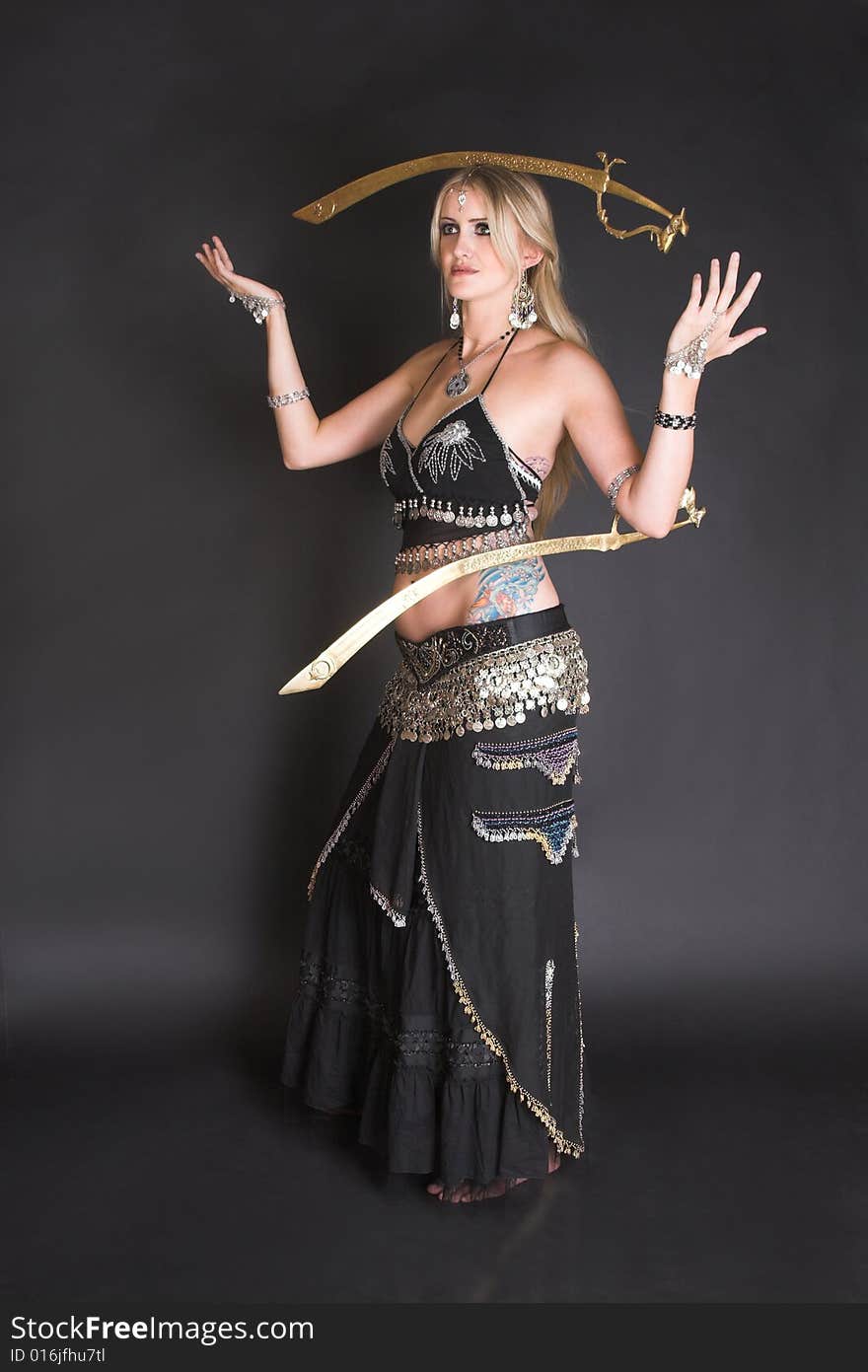 Belly Dancer hands holding Tribal Zagat or finger symbols