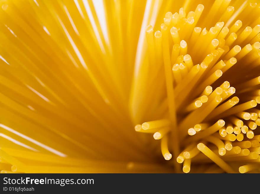 Yellow and beautiful pasta close-up as a background