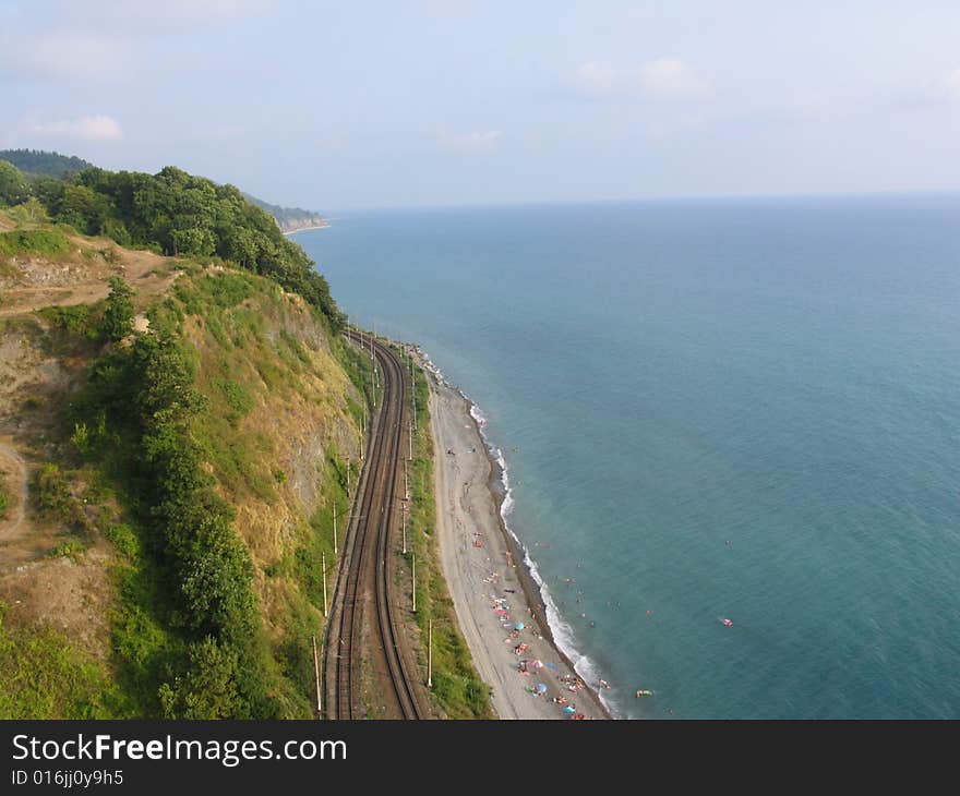 Railway and sea.