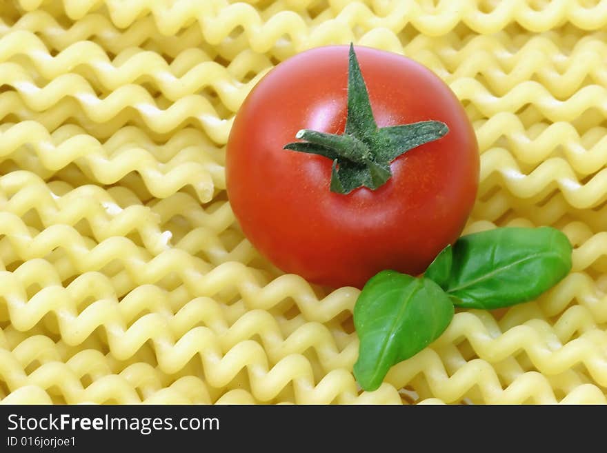 Raw pasta on bright background. Shot in Studio. Raw pasta on bright background. Shot in Studio.