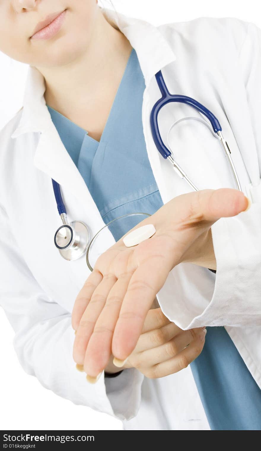 Close up of doctor holding an effervescent  calcium pill isolated on white. Close up of doctor holding an effervescent  calcium pill isolated on white