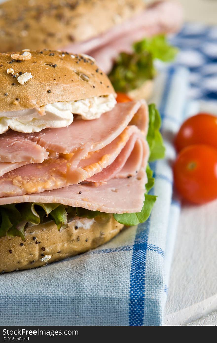 Close up of a fresh bagel with honey roasted ham