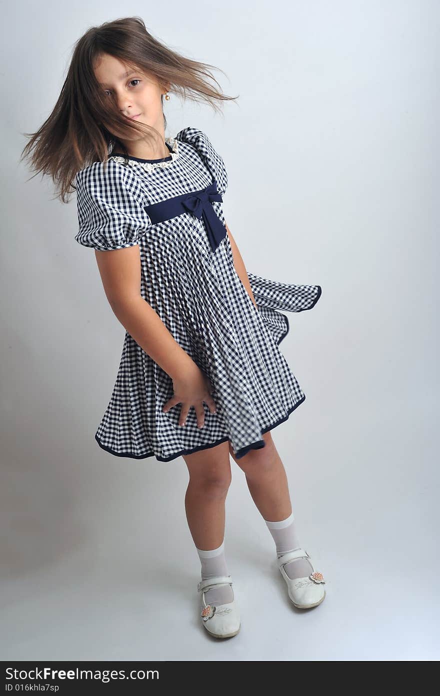 Close up portrait of a little girl dancing