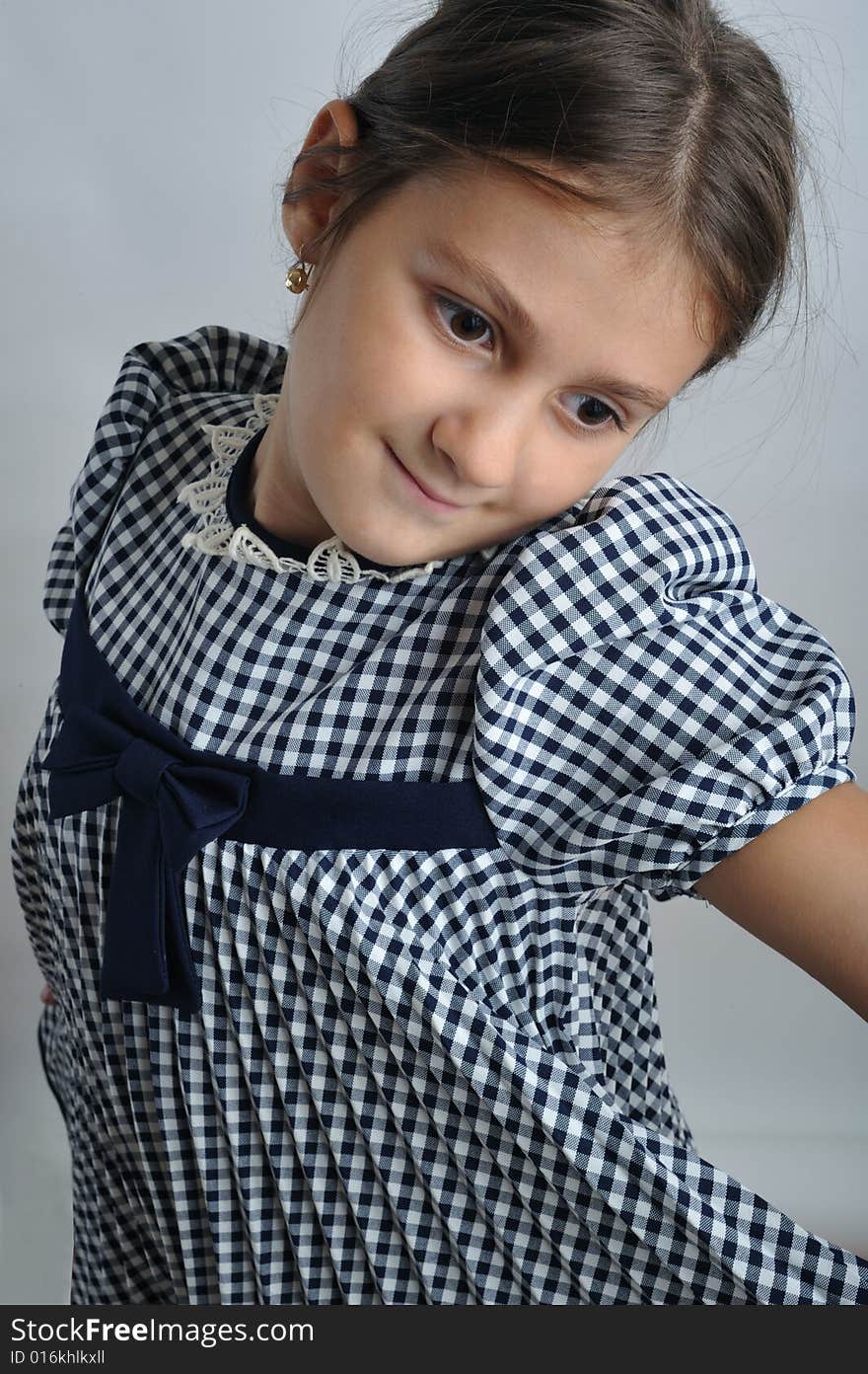 Close up portrait of a little girl dancing