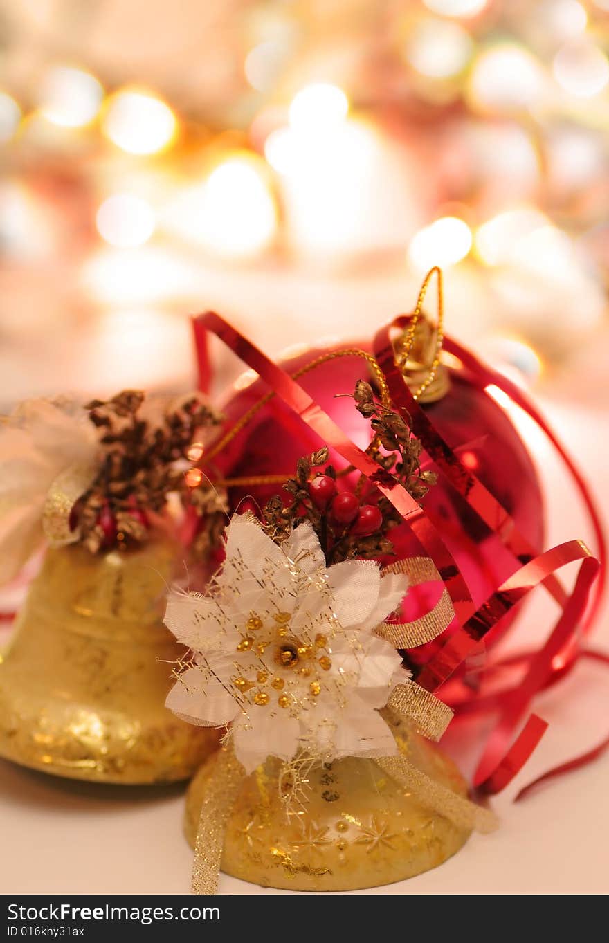 Christmas bells and ball with blur background. shallow DOF