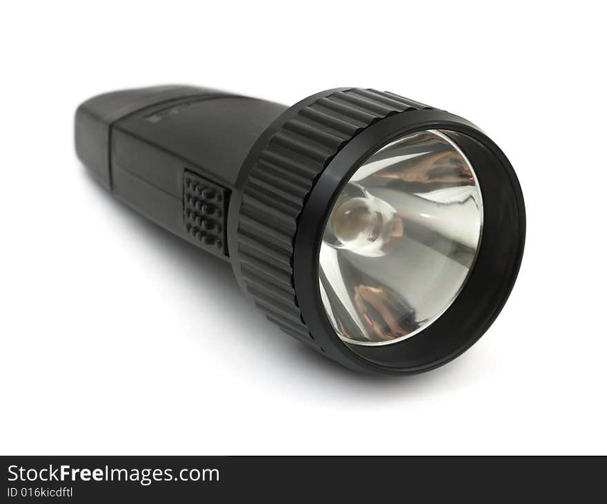 Close-up of flashlight isolated on white background