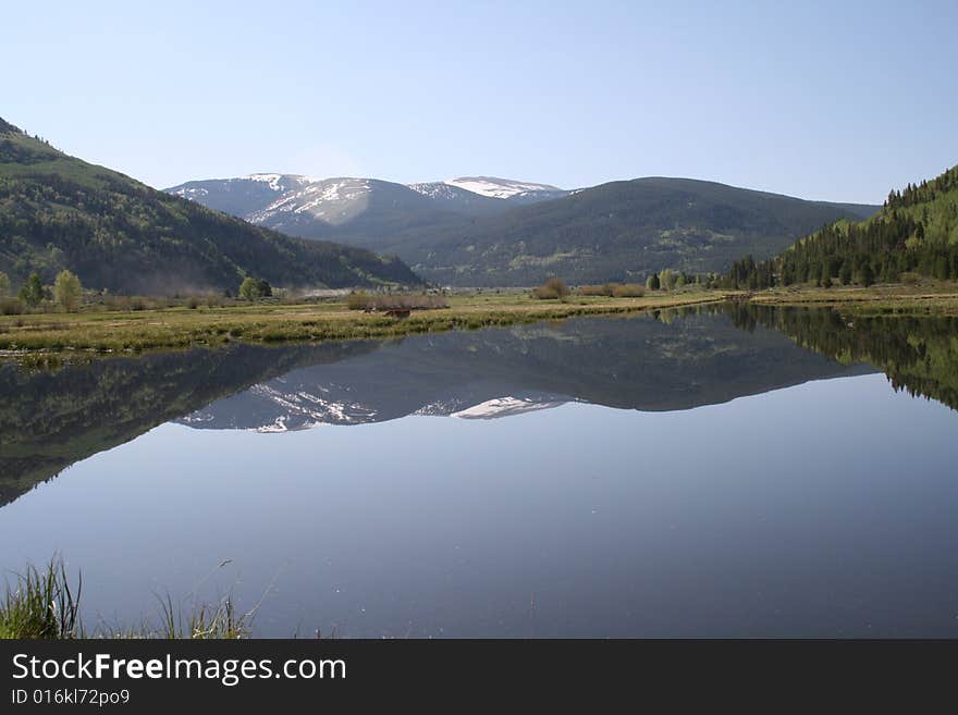 Chicago Ridge in Rocky Mountains Reflected in a Pond at Camp Hale. Chicago Ridge in Rocky Mountains Reflected in a Pond at Camp Hale.