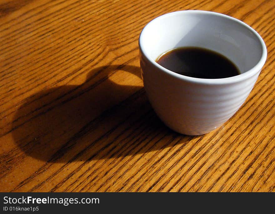 Coffee cup on Wood Table