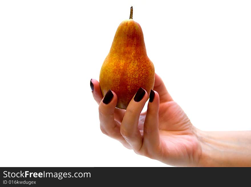 Hand holding pear on white background