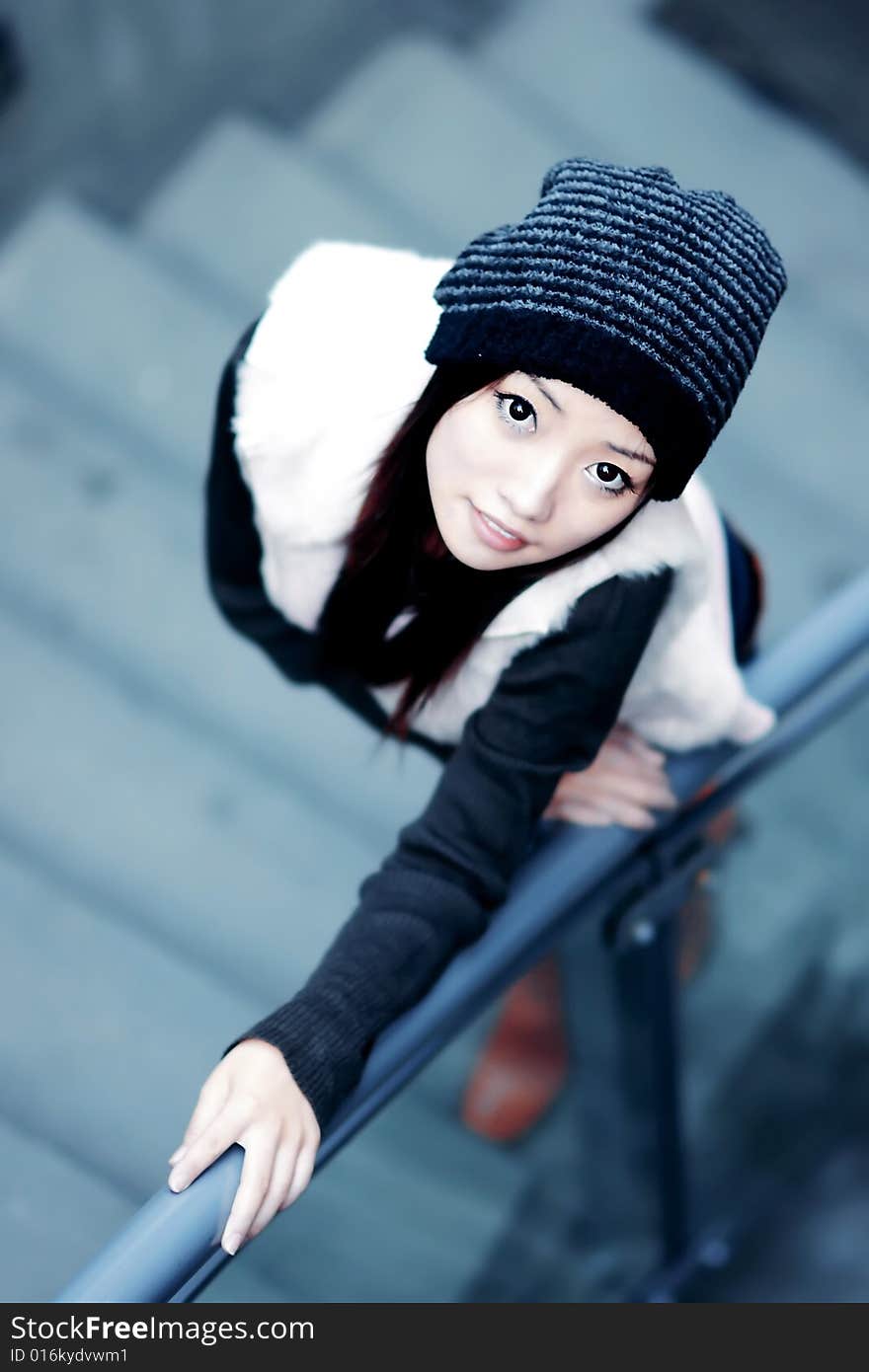 Young woman Young womaportrait on stair background