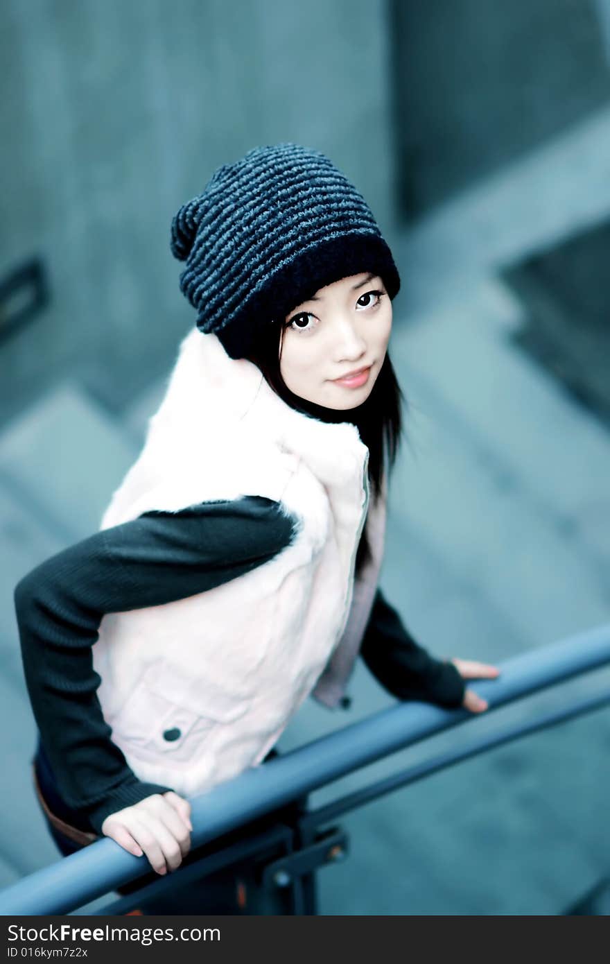 Young woman Young womaportrait on stair background