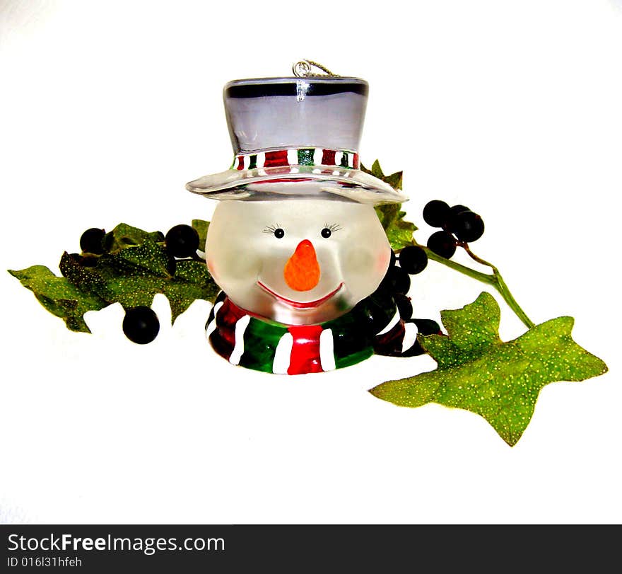 Snowball. Snowman on a white background.
Beautiful winter mood snowman in winter.