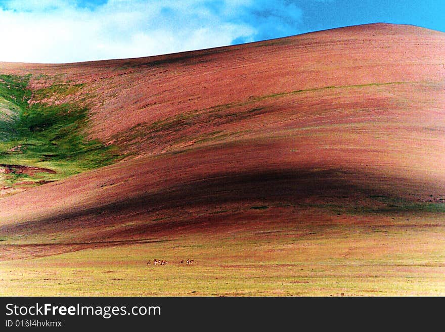 Red mountain and blue sky