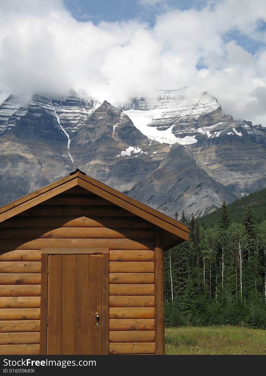 Cottage at the foot of mountains