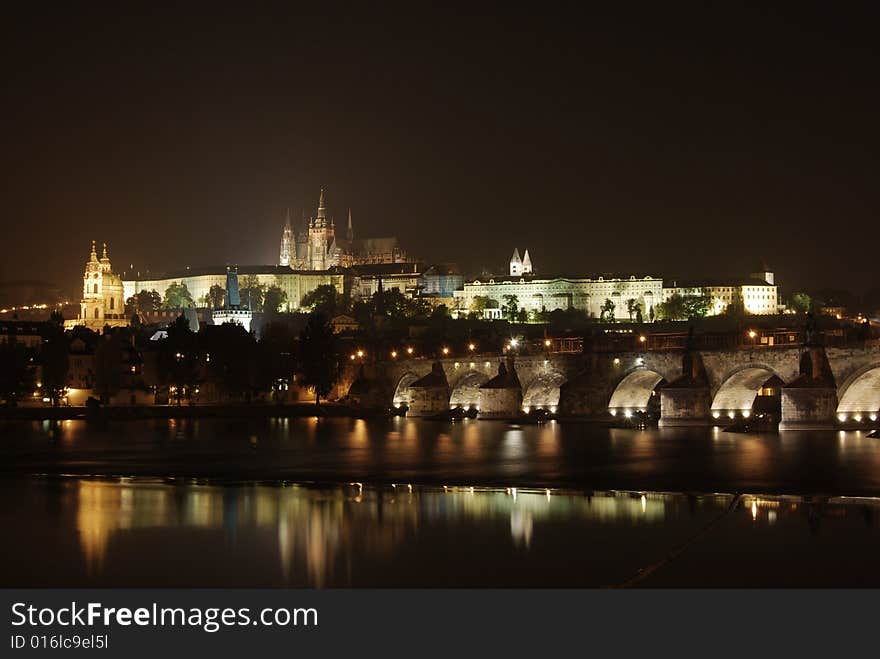 The night sky is lit up with Prague castle and the Charles bridge in the Czech Republic.
. The night sky is lit up with Prague castle and the Charles bridge in the Czech Republic.