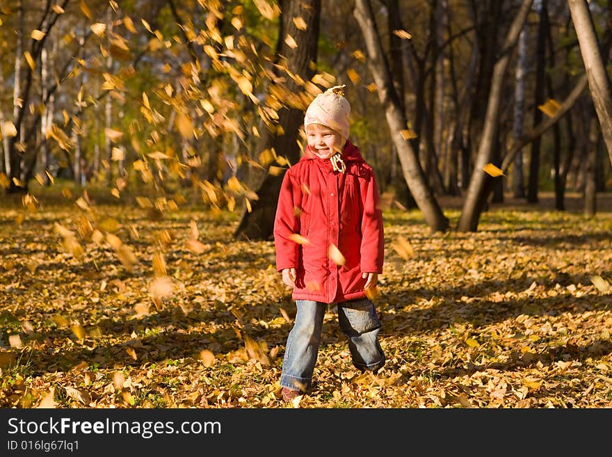 Children Throw Autumn Leaves 2