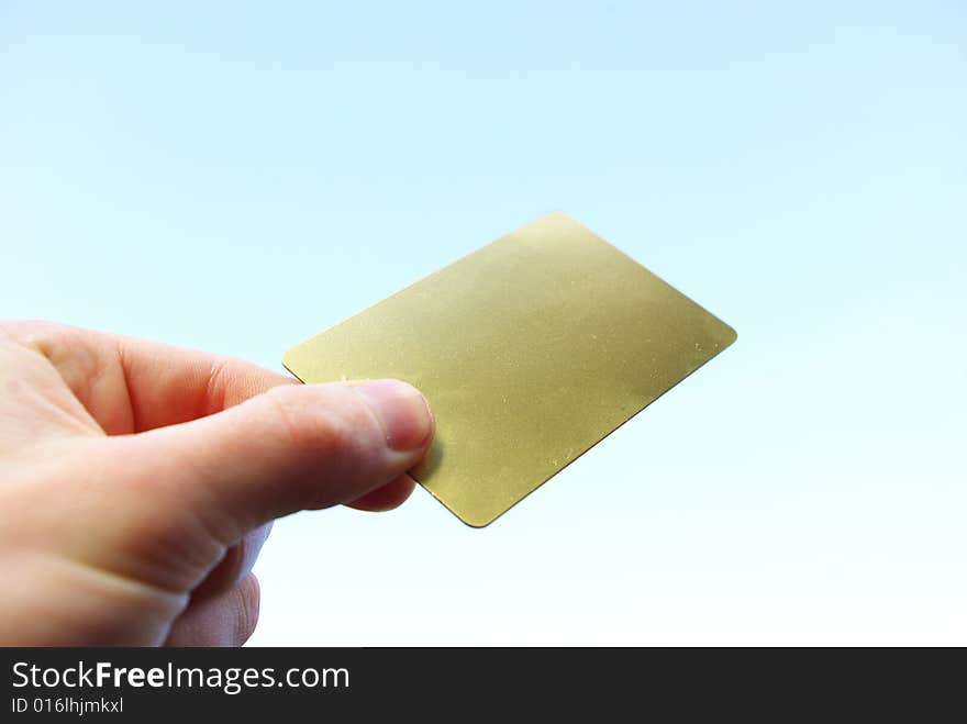 Man hand holding a blank business card