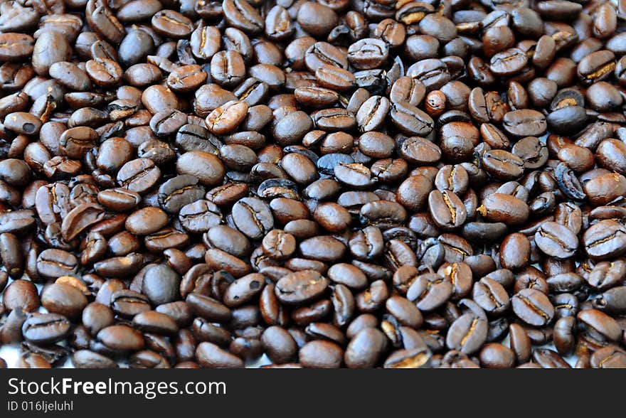 Close up shot of some coffee beans,ideal background. Close up shot of some coffee beans,ideal background
