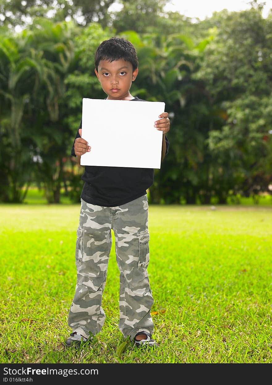 Asian boy of indian origin in the park