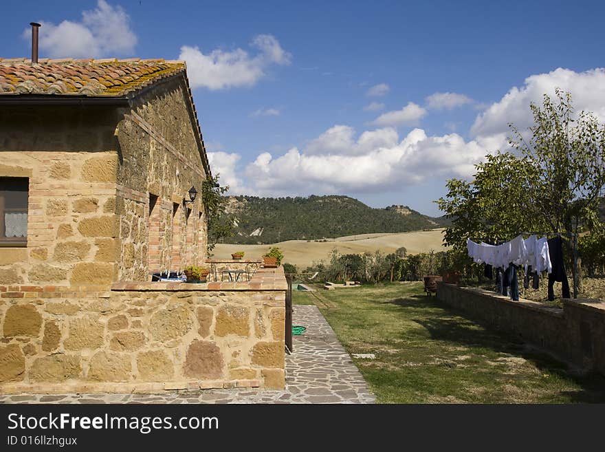 The garden of a luxury country house in the famous Tuscan hills, Italy. The garden of a luxury country house in the famous Tuscan hills, Italy.