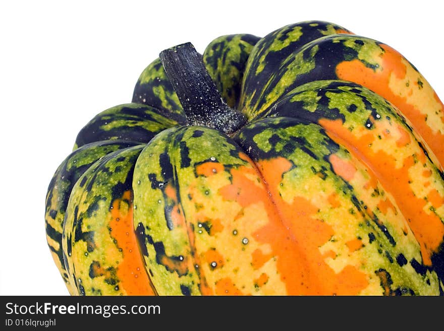 A colorful orange, yellow and green Carnival winter squash. A colorful orange, yellow and green Carnival winter squash