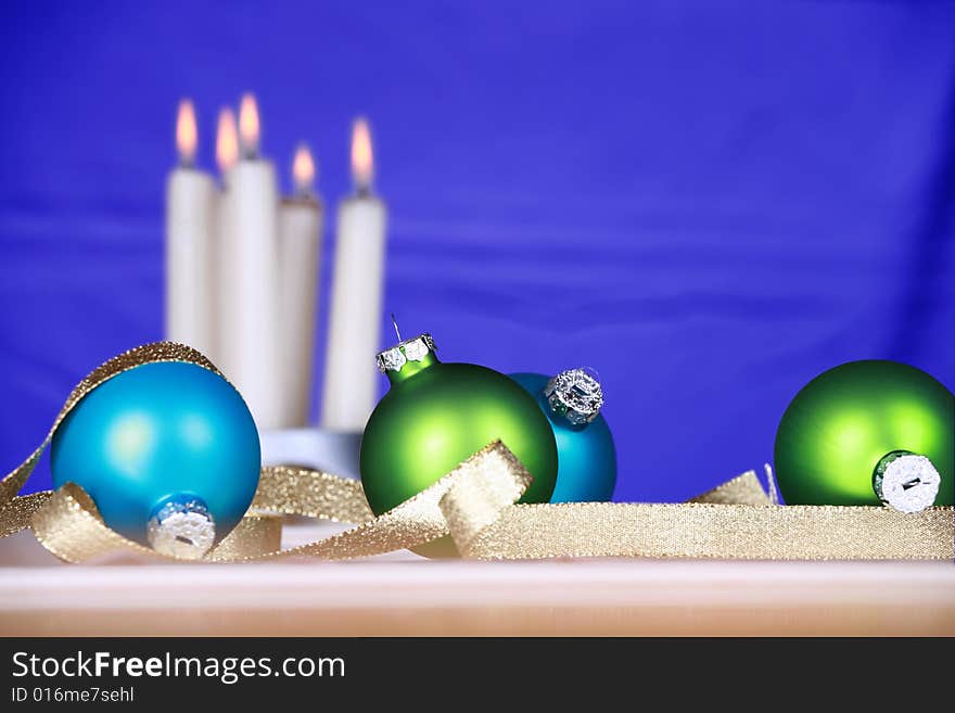 Blue and green ornaments with candles