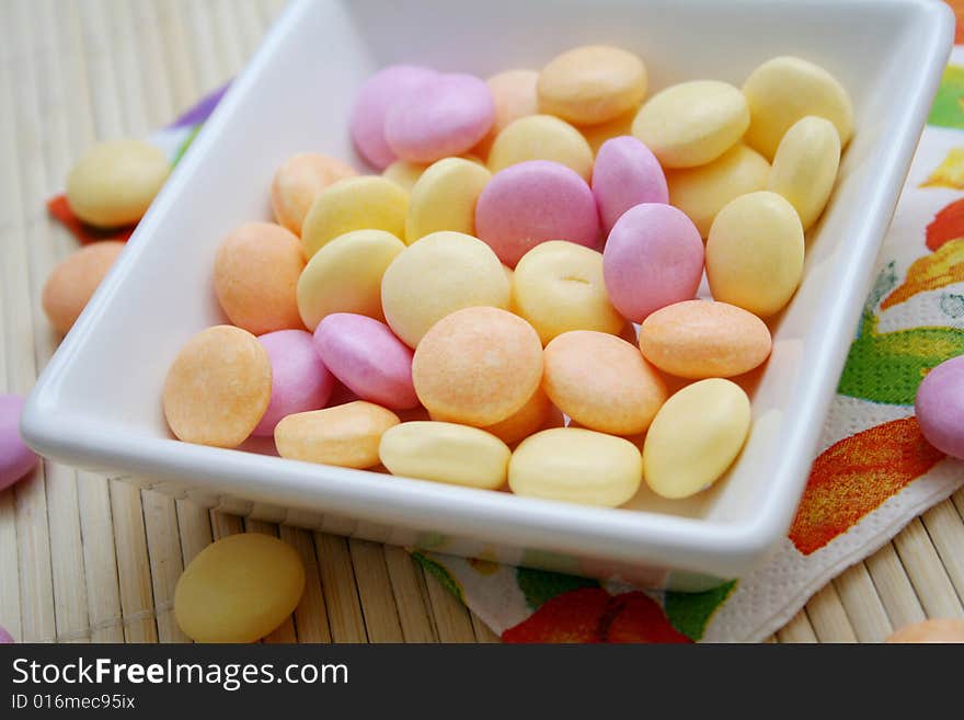 Some colourful sweet candies in a bowl