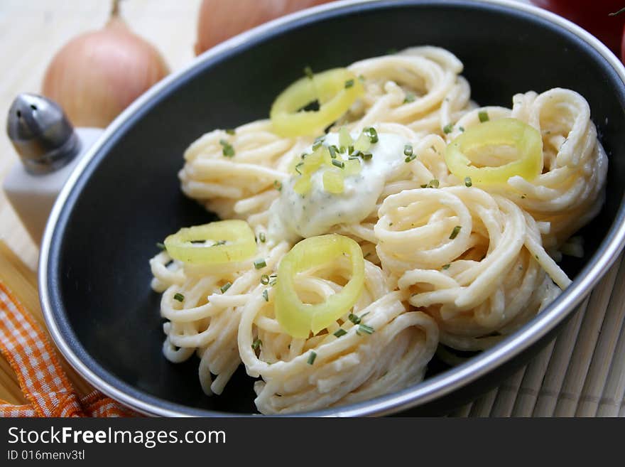 Italian noodles with cheese sauce and paprika. Italian noodles with cheese sauce and paprika