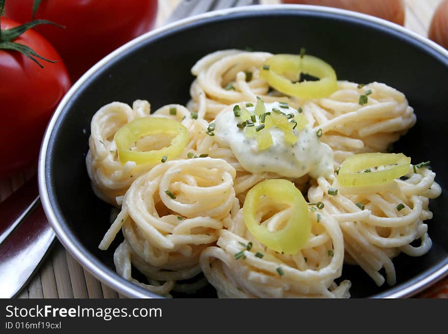 Italian noodles with cheese sauce and paprika. Italian noodles with cheese sauce and paprika