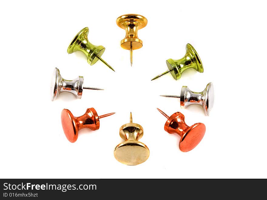 Colorful Metallic Push Pins on white background