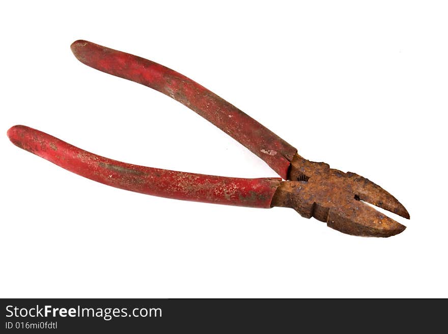 A worthless old pair of rusty wire cutters, isolated on white background. A worthless old pair of rusty wire cutters, isolated on white background.