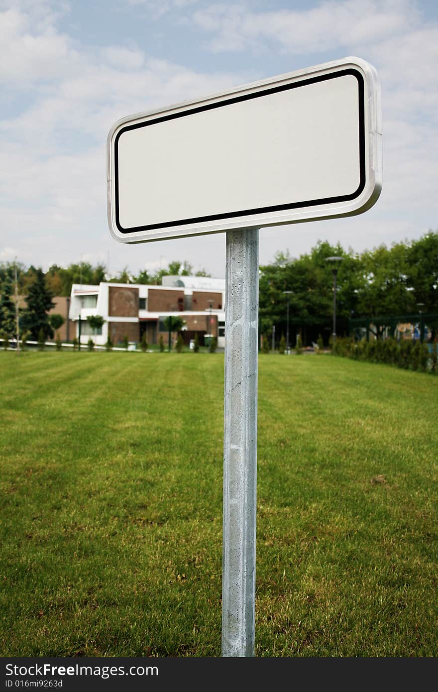 A sign on a lawn. A sign on a lawn