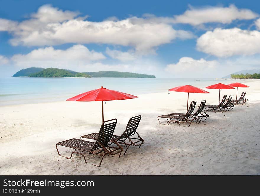 Empty sand beach over sky background