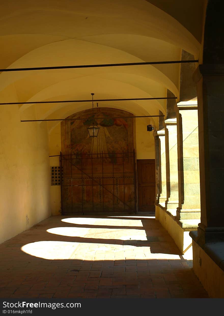 A wonderful shot of a porch in an ancient cloister with a suggestive play of light. A wonderful shot of a porch in an ancient cloister with a suggestive play of light