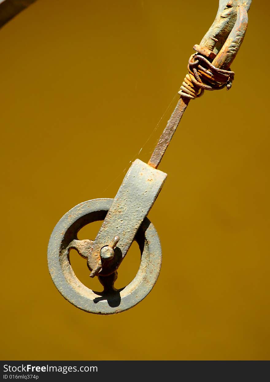 A wonderful close up of a pulley of a weel