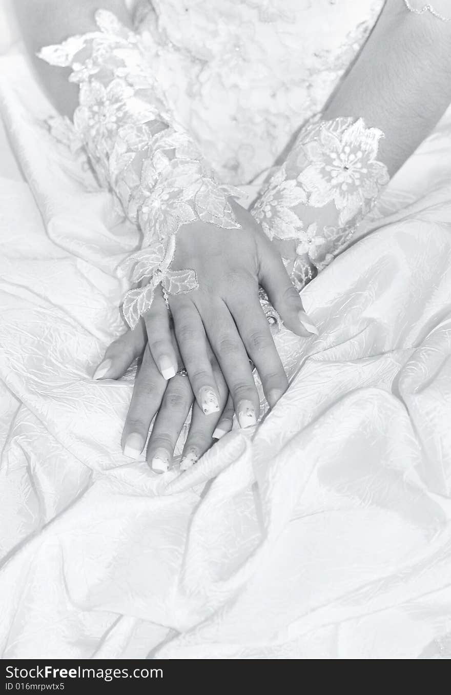 Hands of the young bride