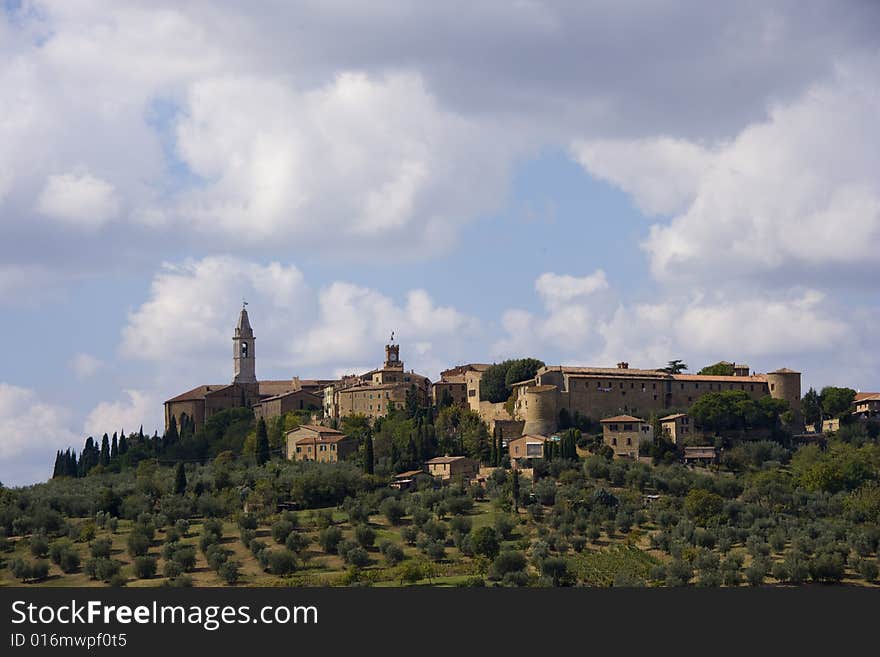 The medieval town Pienza in italy in the soft light just after sunrise. The medieval town Pienza in italy in the soft light just after sunrise